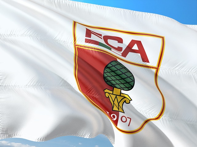 Kiel’s Impressive Victory Against Augsburg Pushes Them Closer to Relegation Playoffs
